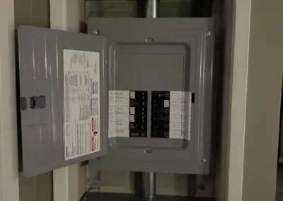 A metal box with electrical equipment in it.